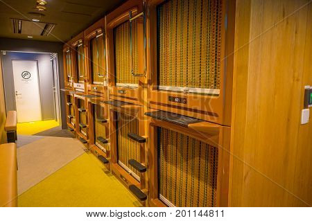 TOKYO, JAPAN JUNE 28 - 2017: Interior view of capsule hotel in city center. Capsule Hotels are less expensive structures very famous in Tokyo, Japan.