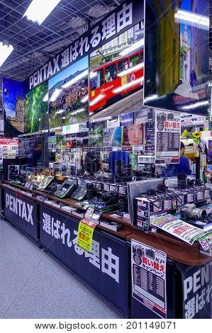 TOKYO, JAPAN JUNE 28 - 2017: Assorted cameras and lenses inside of Yodobashi camera department store. Yodobashi Camera is a chain store mainly selling electronic products with 21 stores in Japan.