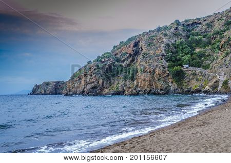 Landscape of a sunset on a beach of one of the Aeolian Islands Panarea