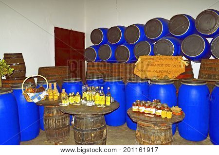 Querenca Algarve Portugal - October 6 2014 : Aguardente Medronho Mourinha is a local brandy made from the fruit of the Strawberry Tree
