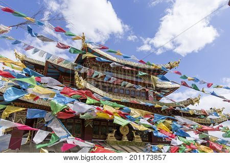 Tibetan buddhist Temple, with prayer flags Zhongdian, Yunnan - China