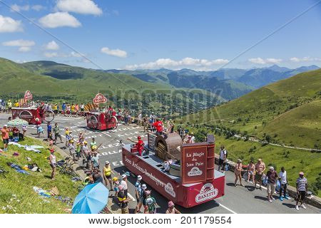 Col de PeyresourdeFrance- July 23 2014: Banette vehicles during the passing of the Publicity Caravan on the road to Col de Peyresourde in Pyrenees Mountains in the stage 17 of Le Tour de France on 23 July 2014.