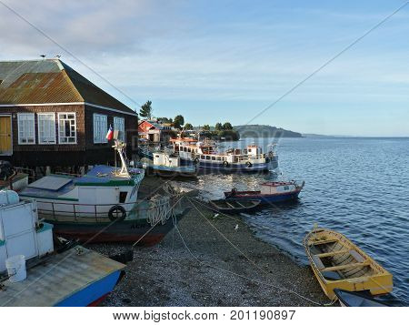 Fishing Boats on the seashore at Chiloé island Chile