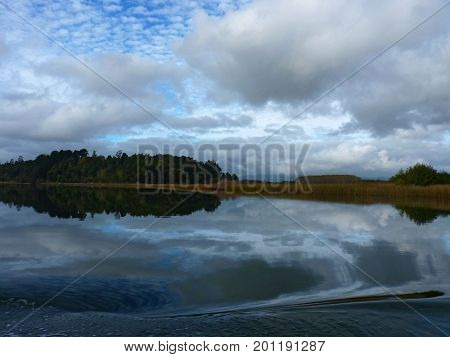 Lagoon reflections on a cloudy day The picture was taken in Valdivia Chile