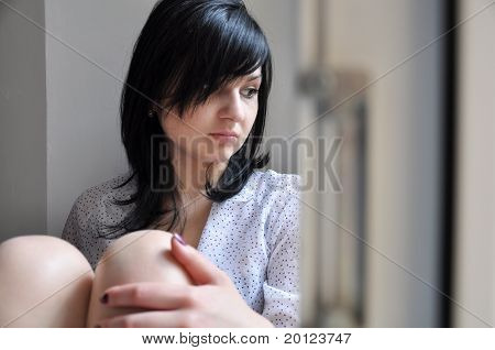 Muchacha en la ventana
