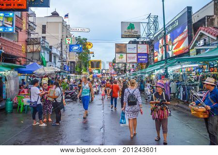 Bangkok, Thailand - August 23, 2017: People walking along the busy streets of Khao San Road in Bangkok, Thailand.