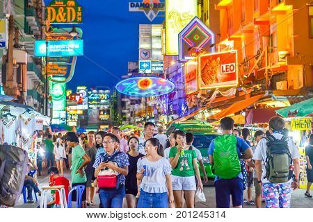Bangkok, Thailand - August 23, 2017: People walking along the busy streets of Khao San Road in Bangkok, Thailand.