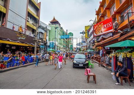 Bangkok, Thailand - August 23, 2017: People walking along the busy streets of Khao San Road in Bangkok, Thailand.