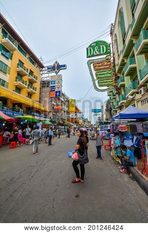 Bangkok, Thailand - August 23, 2017: People walking along the busy streets of Khao San Road in Bangkok, Thailand.