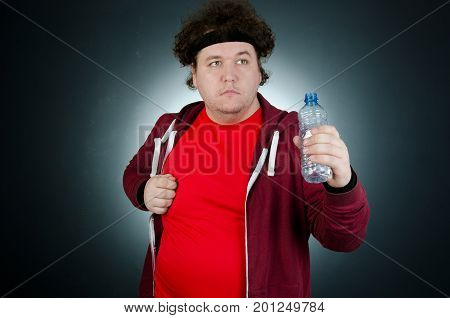 Run. Funny fat man in a hurry. Body care and a healthy lifestyle.