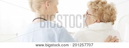 Doctor Patting Ward On Back