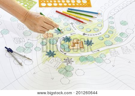 Landscape architect designs Blueprints For Resort .