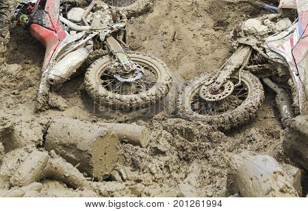 Euduro bike fall down in mud track.
