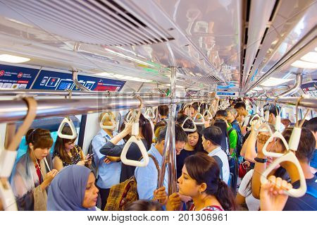 Crowded Singapore Metro Train