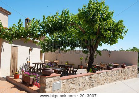 Spanish terrace with chairs and tables outdoor