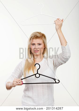 Blonde Woman Holding Clothes Hanger