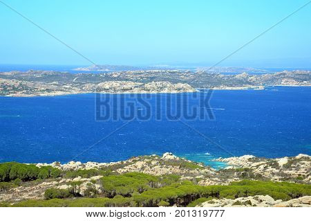 Terrestrial paradise in the Mediterranean. Archipelago of Maddalena, Caprera Island. Corner of the picturesque paradise in the Mediterranean Sea, natural park and pristine with lovely beaches, clear and blue sea with special rocks and mountains