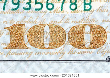 Detail of the newly design U.S. one hundred dollar bill. High resolution photo.