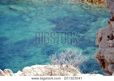 Terrestrial paradise in the Mediterranean. Archipelago of Maddalena, Caprera Island. Corner of the picturesque paradise in the Mediterranean Sea, natural park and pristine with lovely beaches, clear and blue sea with special rocks and mountains
