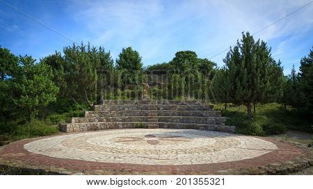 Small outdoor greek theatre in garden. Copy space.