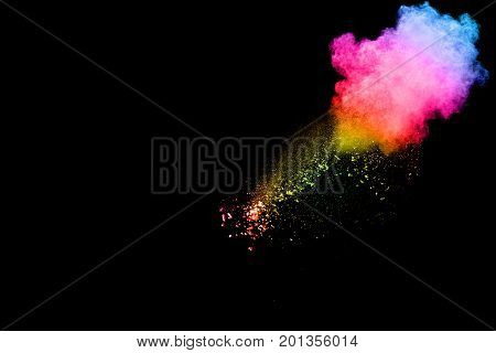 Bizarre forms of powder painted and flour combined explode in front of a black background to give off fantastic colors and forms.