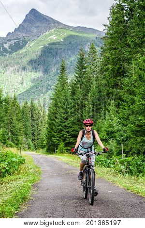 Woman On Mtb Bike In High Tatras Mountains, Slovakia