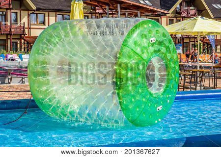 BESENOVA SLOVAKIA - AUGUST 25: Child in ball - aquazorbing at pool in aquapark on August 25 2017 in besenova