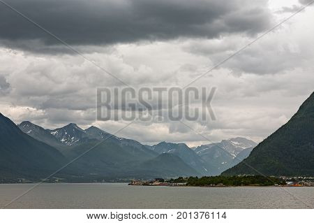 Near Andalsnes along the Romsdalsfjorden under a cloudy sky Norway