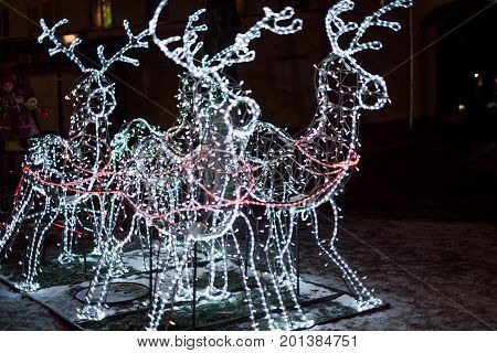 Lighting Decoration Deers With Christmas Tree On The Background In The City Of Gomel During New Year