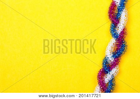 blue pink white rope on a yellow background