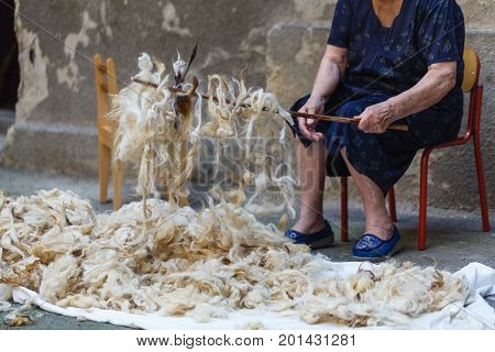 Merino Wool In Hands Of An Old Woman