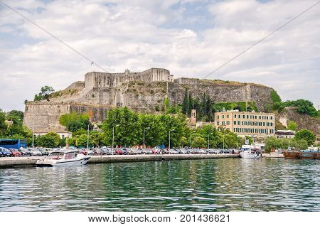Corfu Greece - June 7 2017: View of the new citadel or Neo Frourio - a huge complex of fortifications dominating the northeastern part of the city of Corfu as seen from the sea.
