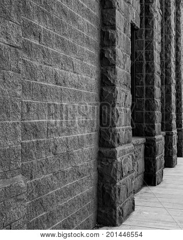 Old stone textured walls of the Bowman Museum in Prineville in Central Oregon.