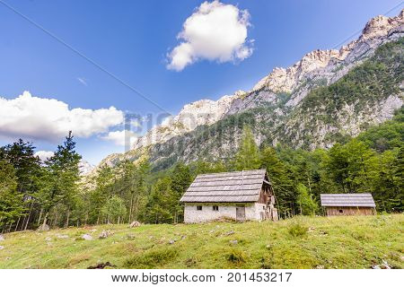 Mountain cabin, hut in European Alps, located in Robanov kot, Slovenia, popular hiking and climbing place with picturescue view