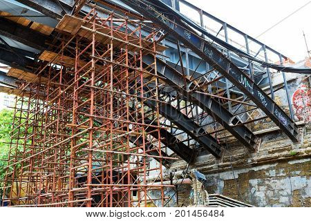 Odessa, Ukraine - October 11, 2016: Bridge Repair. Metallicheskie Support Of The Bridge. Carried Out