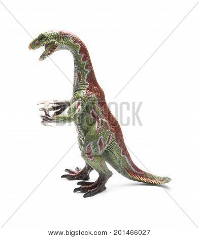 a nothronychus toy on a white background