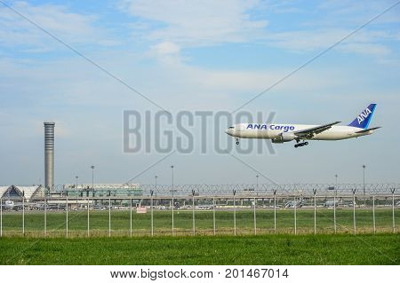 Bangkok Thailand - July 30 2017: ANA Cargo plane landing to runways at suvarnabhumi international airport in Bangkok Thailand. This airport is one of the most populated airports in the world.