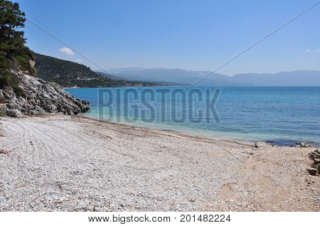 empty pebble beach on greek island Samos