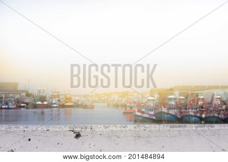 Cement Bridge with Fishing boat on the river for background.