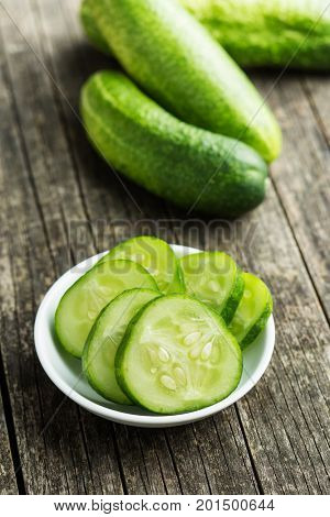 Sliced green cucumbers. Cucumbers in bowl.