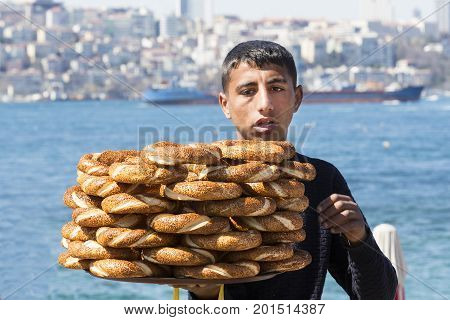 ISTANBUL, TURKEY - 1 APRIL , 2017:Street sales of traditional Turkish bagels Simit, are on the streets of Istanbul in Turkey