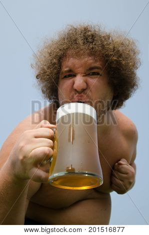 Fat man drinking beer. Funny naked guy.