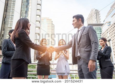 Businessmen shake hands to reach business agreement together Business concept Acheive concept