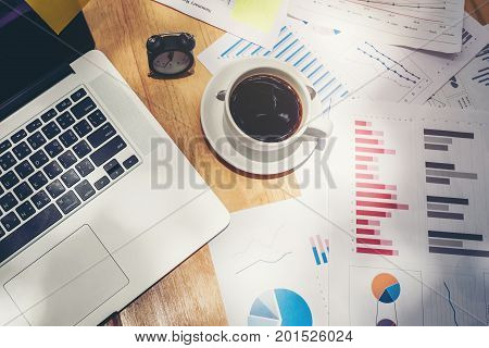 Topview Laptop on desk in Cafe business concept