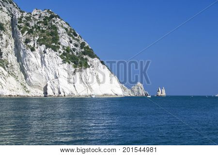 Numana - Due Sorelle bay - White coast with blue sky and sea. for summer vacation concept