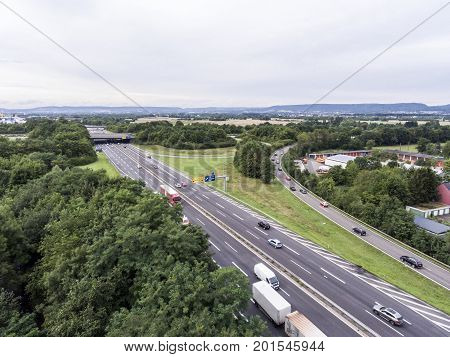 Aerial view of a highway intersection with a clover-leaf interchange in Germany Koblenz