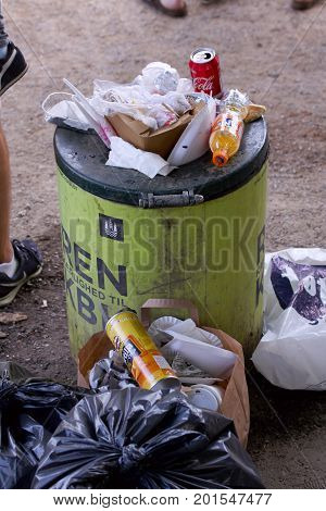 Overfull garbage can in city, Copenhagen August 26, 2017