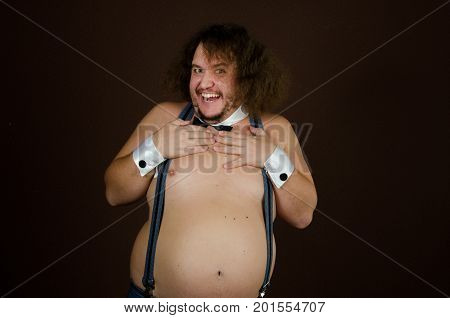 Funny fat stripper. Funny guy with no shirt and exotic dancing.