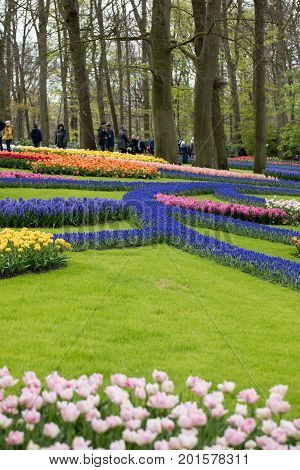 LISSE NETHERLANDS - APRIL 19 2017: Visitors at the Keukenhof Garden in Lisse Holland Netherlands.