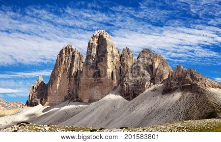 View of Drei Zinnen or Tre Cime di Lavaredo with beautiful cloud on sky Sextener Dolomiten or Dolomiti di Sesto South Tirol Dolomites mountains Italian Alps